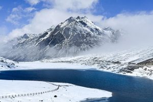 sela lake with snow cladded peaks at background